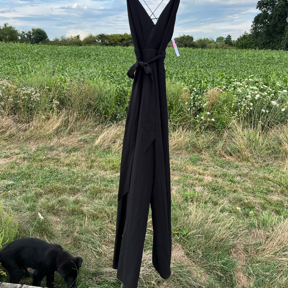 Black spaghetti strap jumpsuit w/ double slits